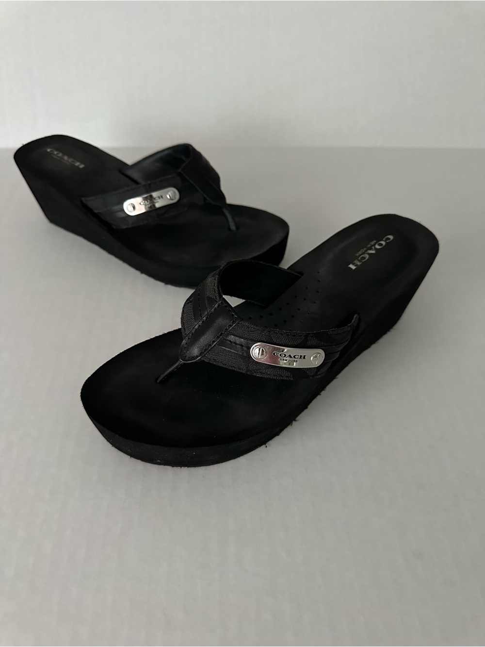 COACH Black Wedge Thong Sandals with Metal Logo Plaque
